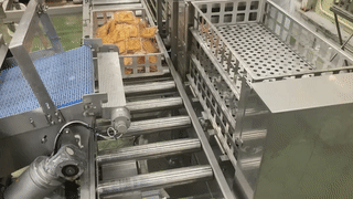 油揚げトレー入装置の画像