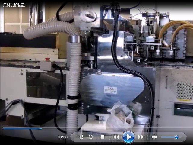 具材トッピング装置の画像